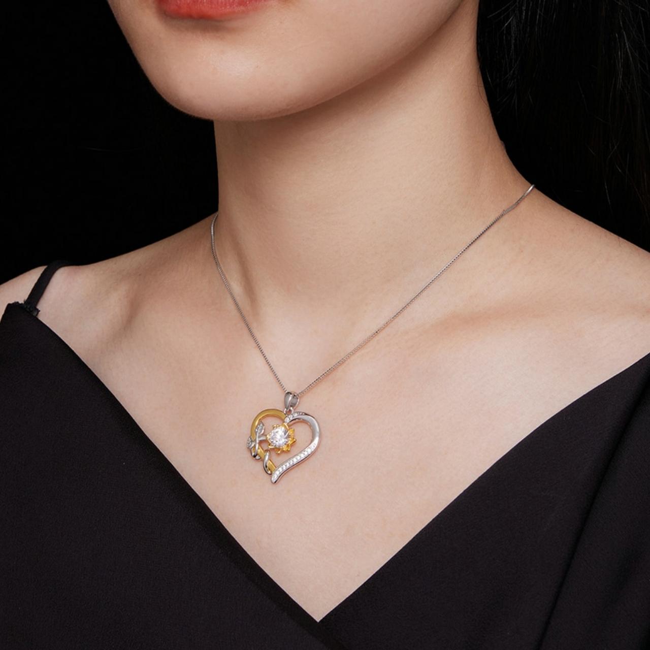 Heart Shaped 1 carat Moissanite Pendant Necklace with Cubic Zirconia in paved setting fashioned on Sterling Silver